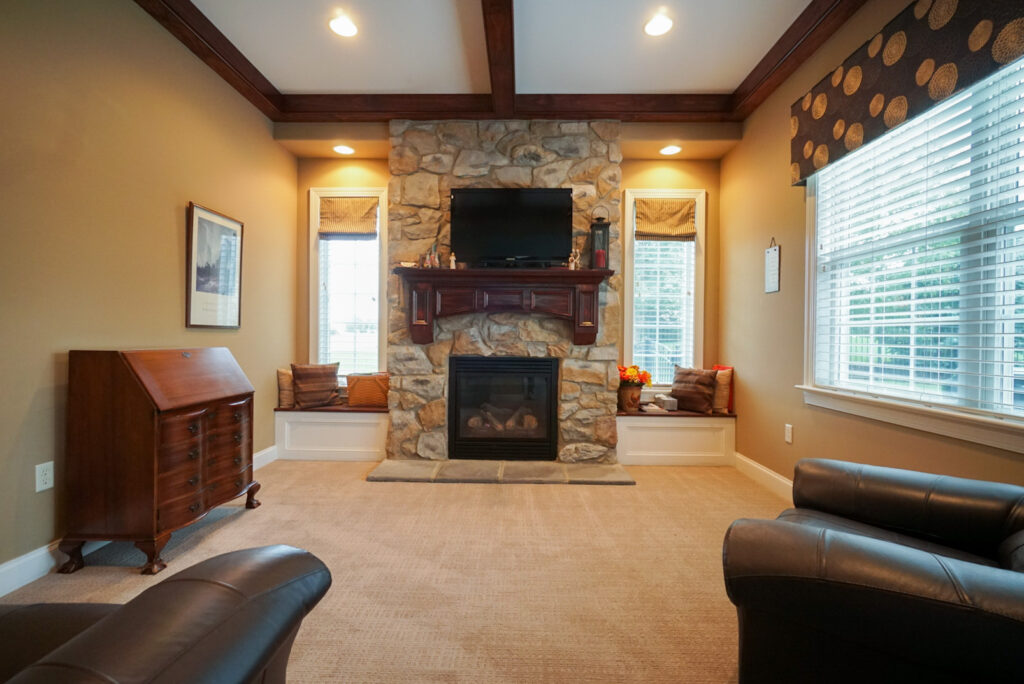 a new carpet installation around a fireplace
